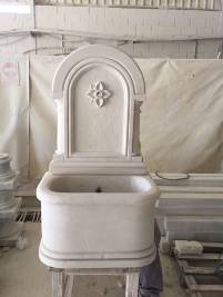 Fuente de pared en piedra caliza Fuente de pared en piedra caliza